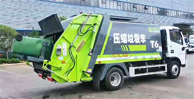 garbage compactor truck.jpeg